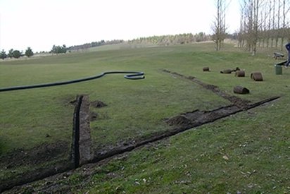 Trenches for main drain installation at Forrester Park Golf Club